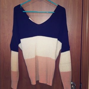 Striped sweater with unique back detailing!